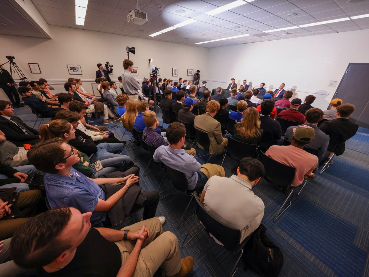 A packed UFCR weekly meeting
